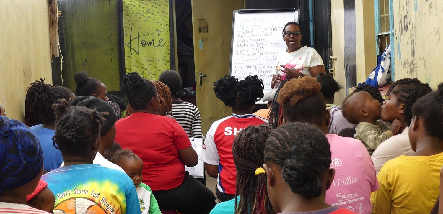 Joan facilitating a session with young mothers